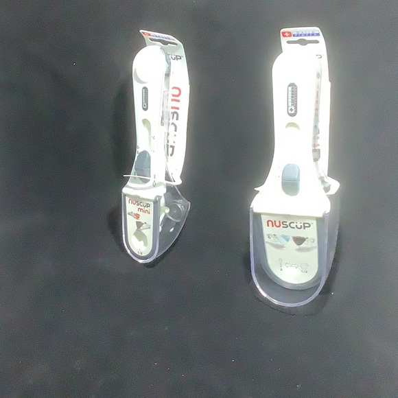 Swissmar Set of Adjustable Measuring Cup and Measuring Spoon. - Picture 1 of 3